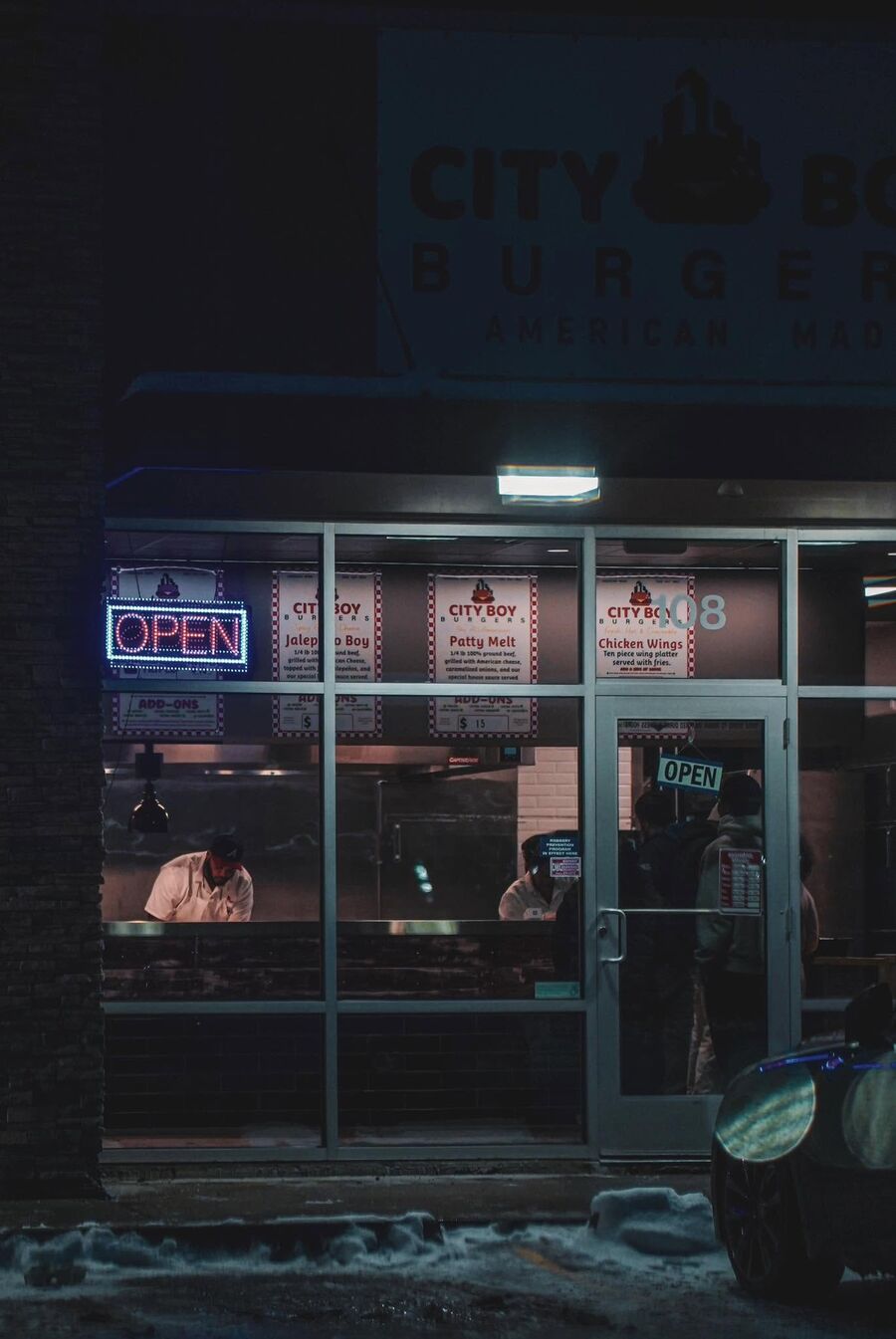 The City Boy Burgers storefront on a winter night